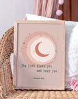 Christian pink kids blessing print of Numbers 6:24 — The Lord bless you and keep you — with moon and stars with girls room setting