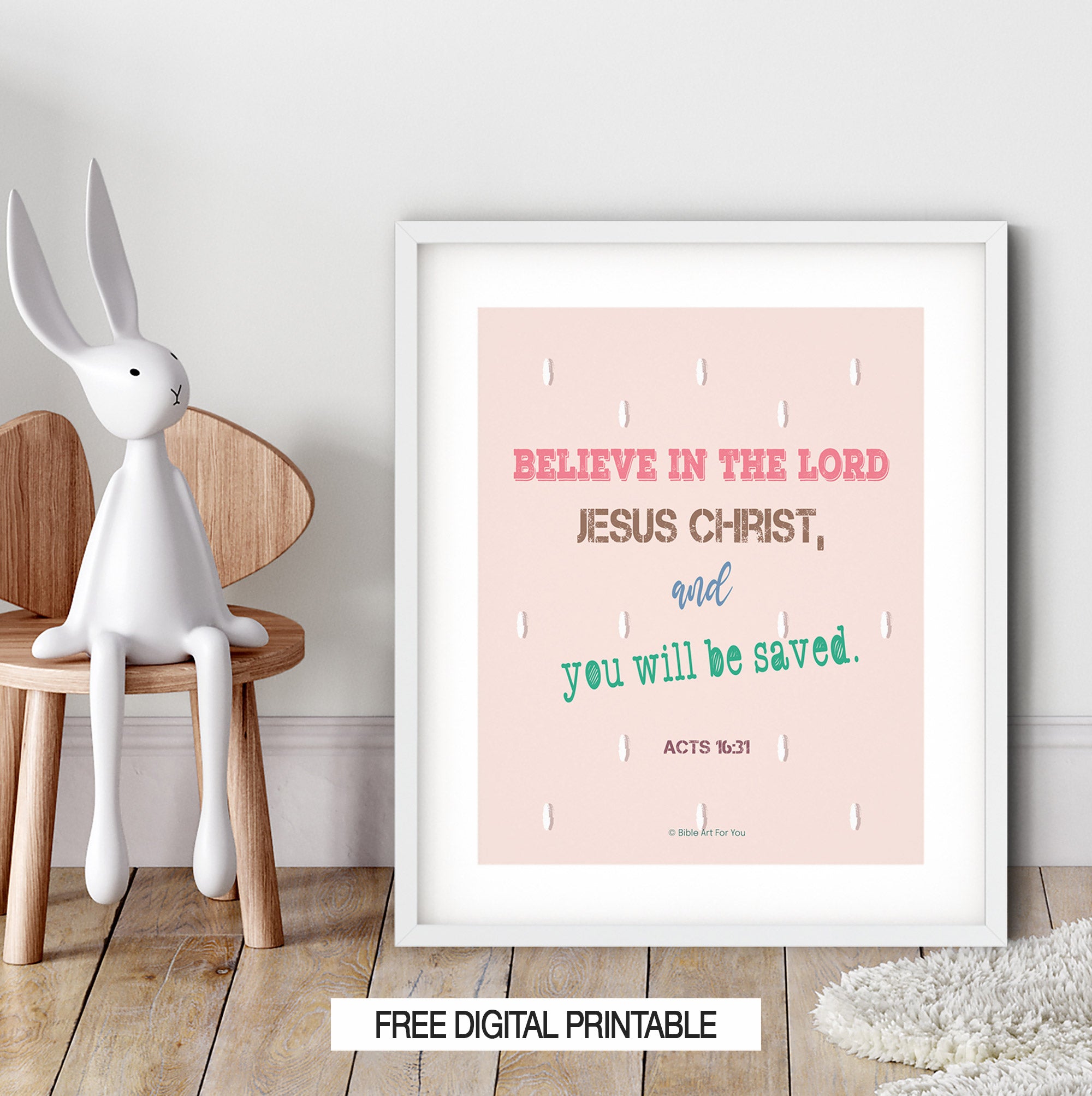 Pink Acts 16:31 printable Bible verse art displayed in bedroom decor