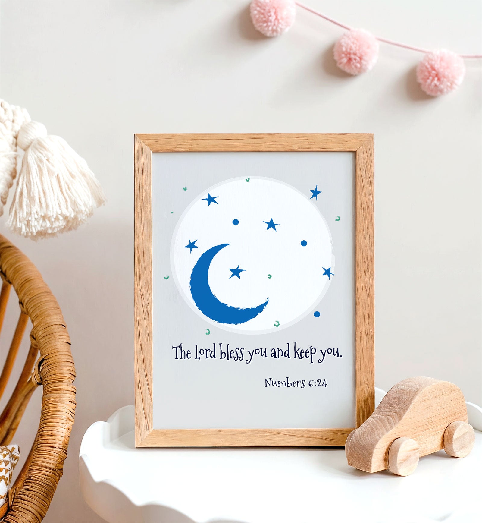 Soothing blue Numbers 6:24 wall art with moon and stars in nursery bedroom
