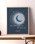 Moon and star nursery wall art with Numbers 6:24 blessing displayed in a baby's room