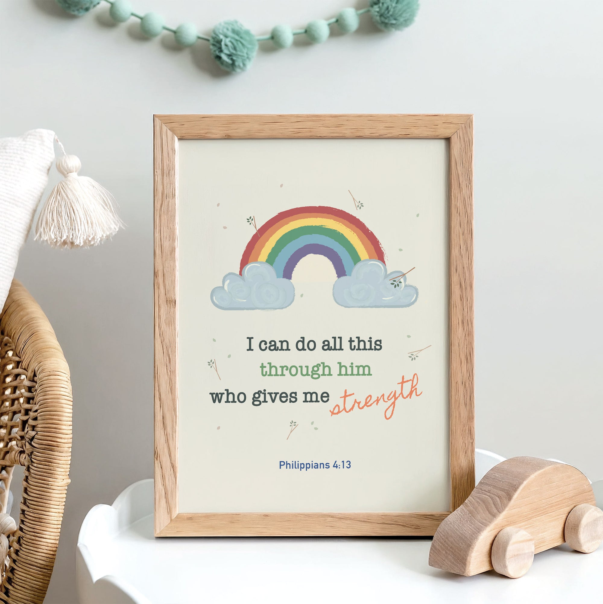 Colorful kids wall art with Philippians 4:13 displayed in a child's bedroom