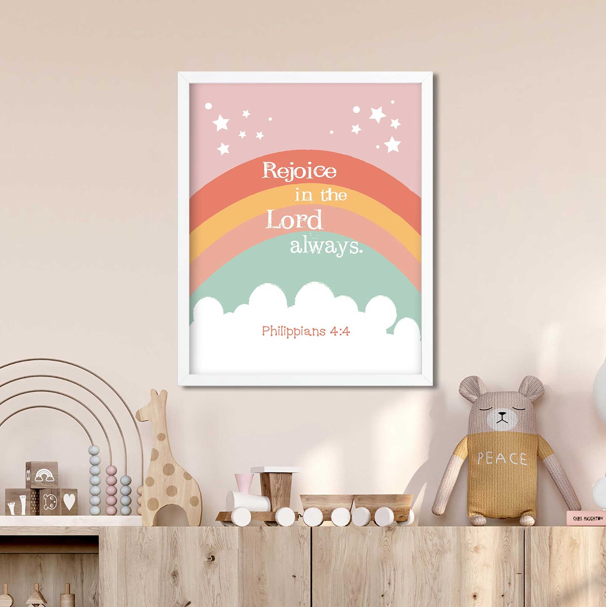 Christian kids room decor featuring Philippians 4:4 boho rainbow wall art with wood decor